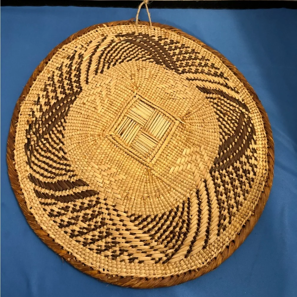 Vintage handwoven Tonga basket. Made with natural materials. Home decor.